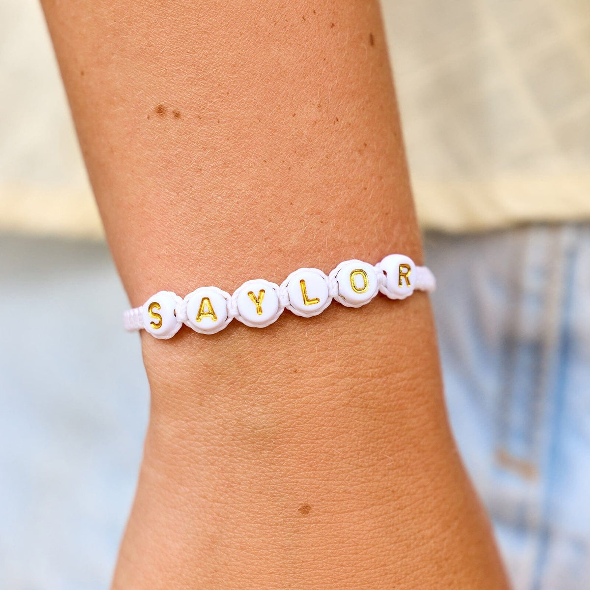 White Alphabet Bead Bracelet