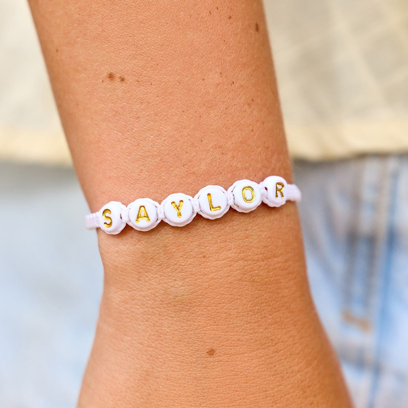 White Alphabet Bead Bracelet