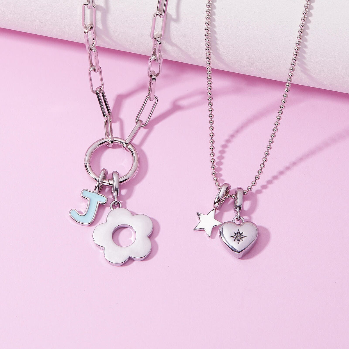 Harper Starburst Heart Charm