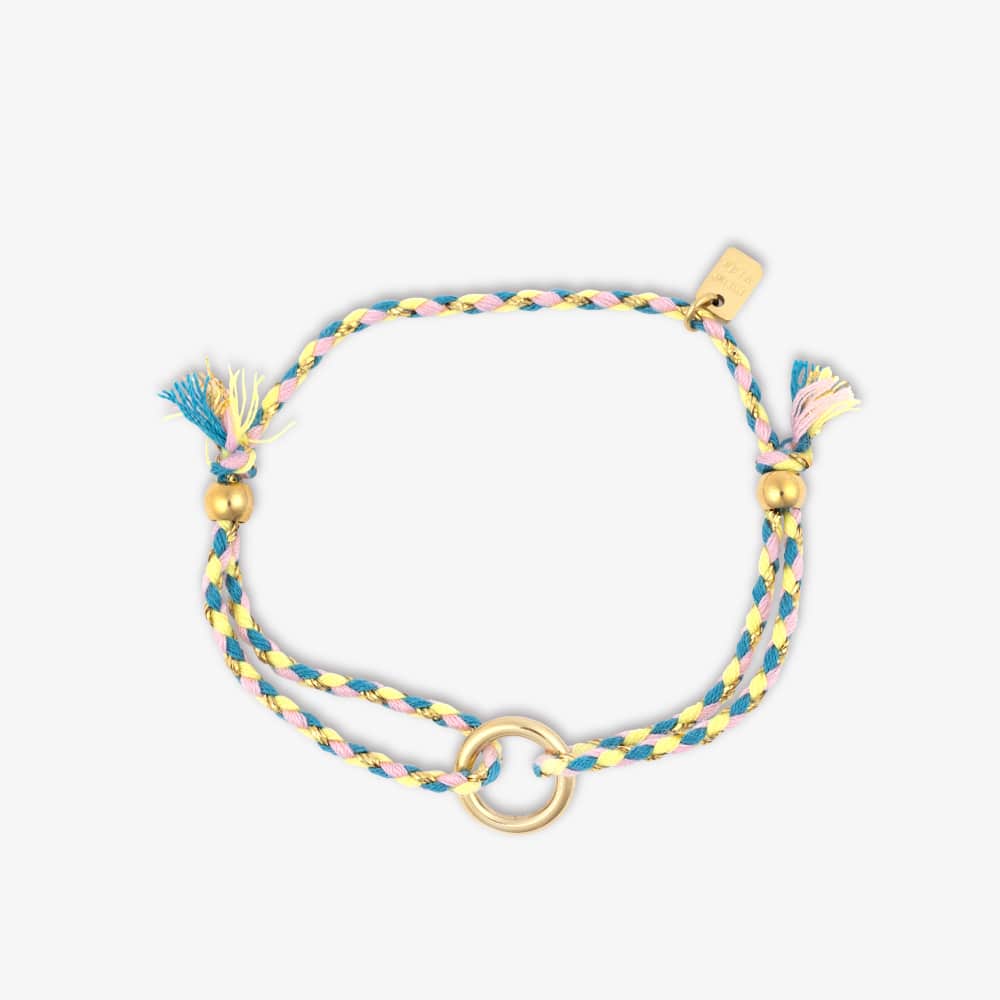 Colorful braided bracelet with gold accents on a white background