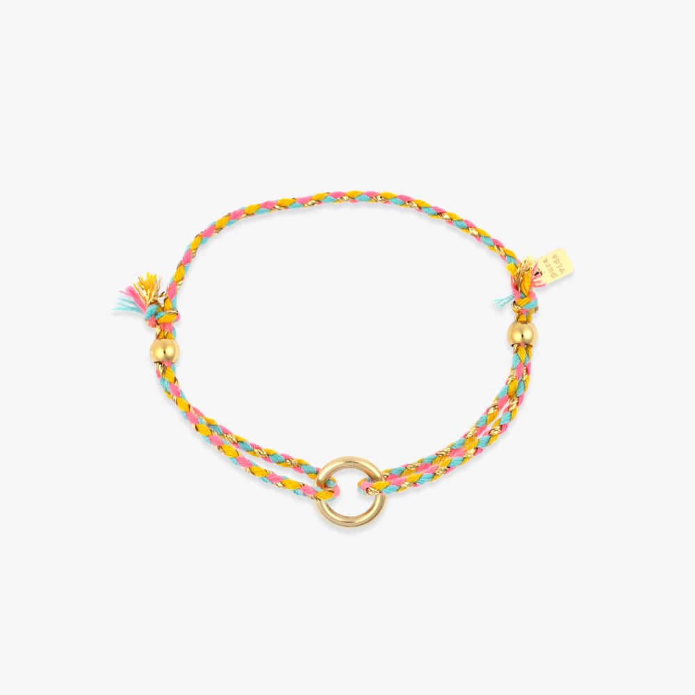 Colorful braided bracelet with gold accents on a white background