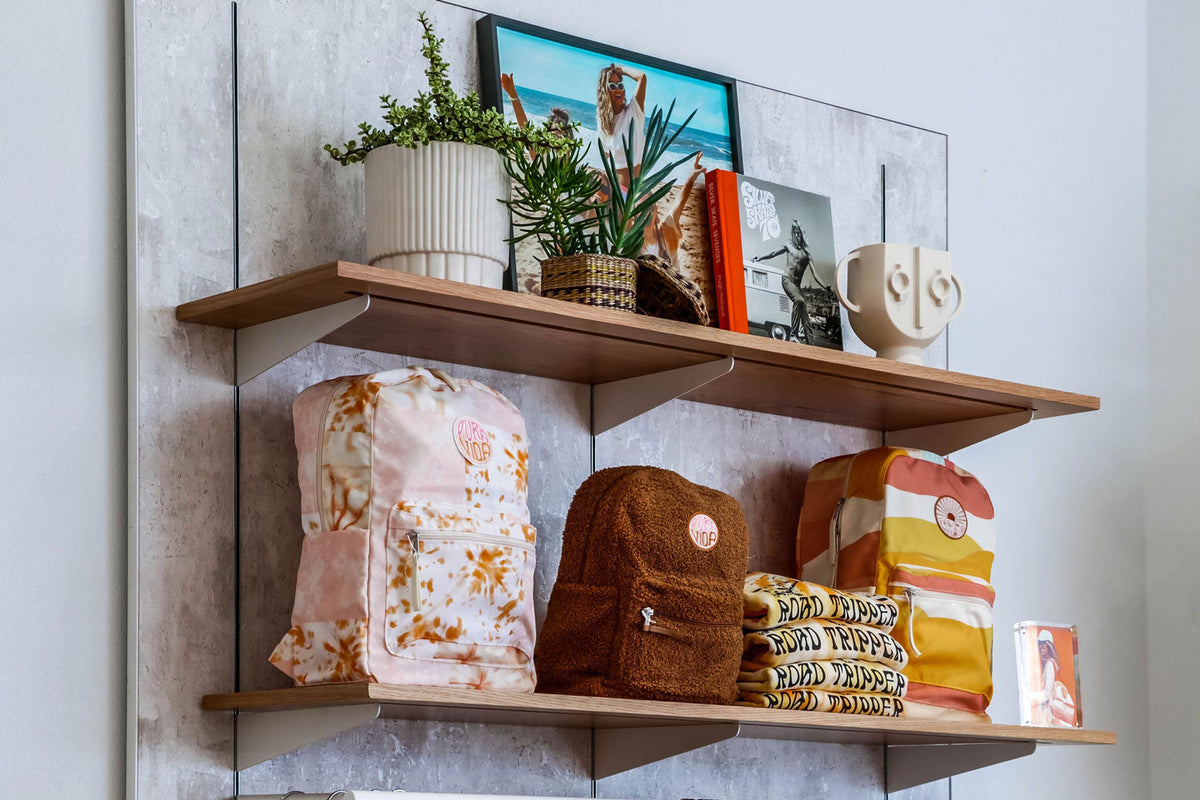 Pura Vida backpacks on a shelf